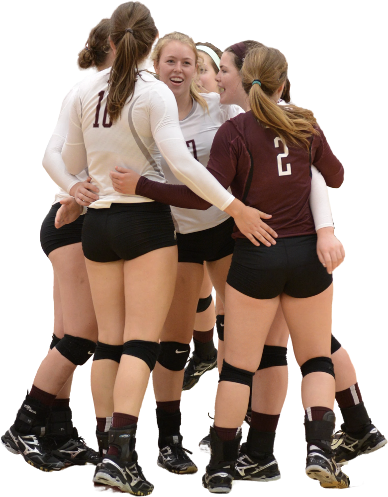 Een volleybal team viert het behalen van een punt. De speelster geven elkaar een bemoedigende tik op de billen.